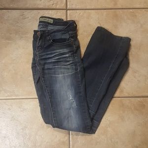 Cafe` Distressed Low-Rise Bootcut Jeans